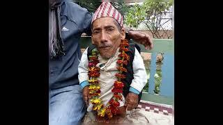 Anbu s. Of kolar, karnataka ,shortest man in India .2.95 feet