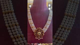 Pearl choker Tanishq Barasat