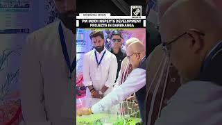 PM Modi inspects model of development projects of which he will lay foundation stone in Darbhanga