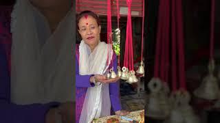 A bell seller lady at Tillinga Mandir