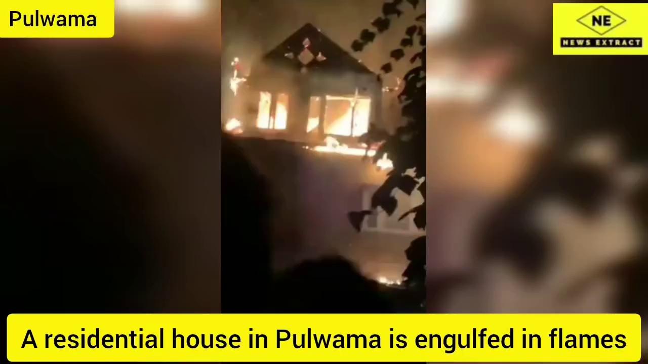 A residential house in Pulwama is engulfed in flames