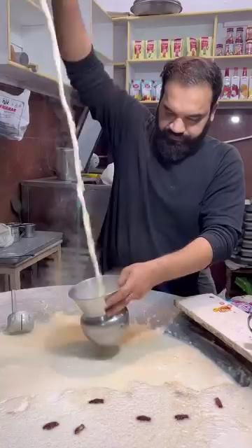 Moti malai wala kadhai ka doodh at bazar Sita Ram near chakki