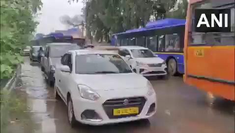 Traffic jam in parts of Delhi as a result of rains and waterlogging; visuals from Najafgarh Road.