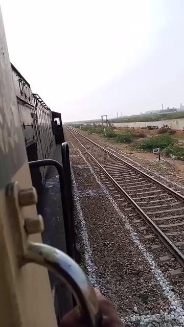 151 UP Shah Latif Express,
powered by HGMU-30R (8228) locomotive, Running Near 'Bin Qasim' Railway
Station, On Karachi
Kotri Section.