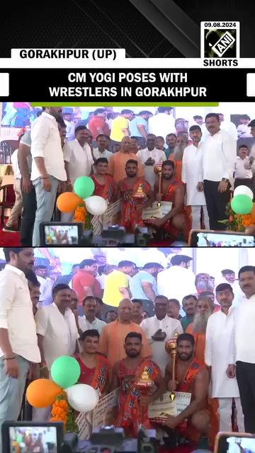 UP: CM Yogi poses with wrestlers during a competition in Gorakhpur