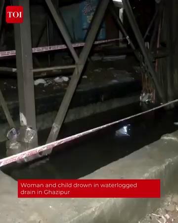 Watch | A 22-year-old woman, Tanuja, and her three-year-old son Priyansh in a waterlogged drain near Khoda Colony in Ghazipur. The incident has prompted legal action by the #Ghaziabad Police.