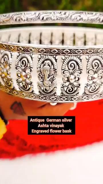 *Antique German silver Ashta vinayak engraved flower
basket*