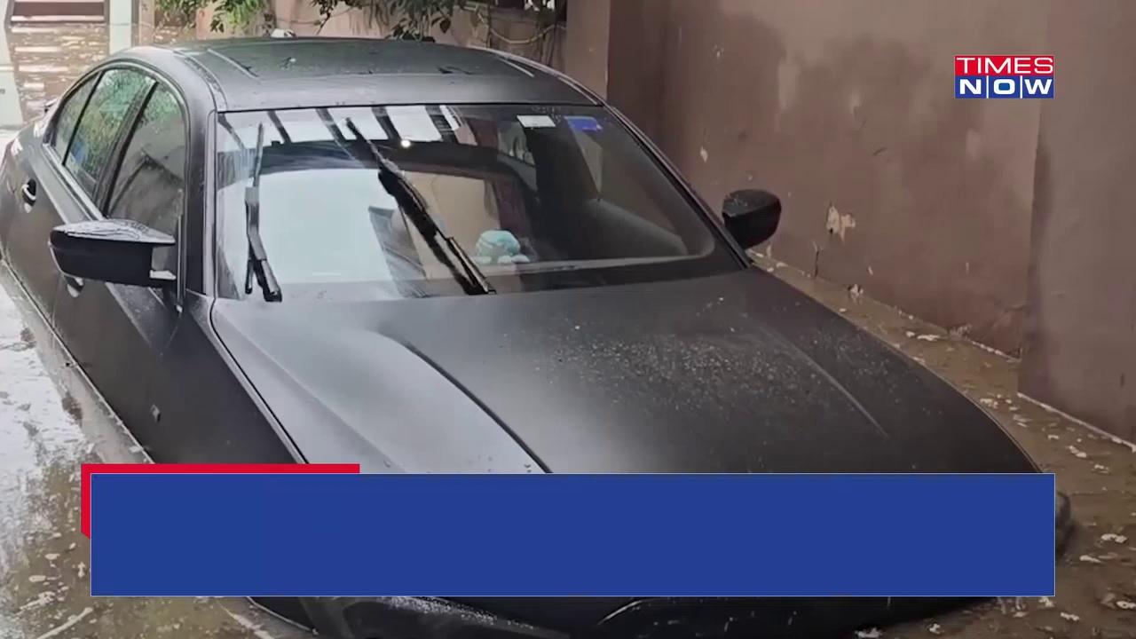 A Gurugram resident shared a video on social media claiming that his luxury cars sustained severe damage following heavy rainfall which led to flood like situation. The social media user Gajodhar Singh posted a video showing his BMW partially submerged in muddy flood water. The luxury car is valued at a whopping Rs 83 lakh. Watch.