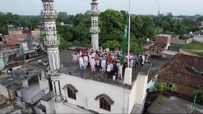 Hoisting flag on Madina Masjid at Dhaurahra Sant Kabir Nagar