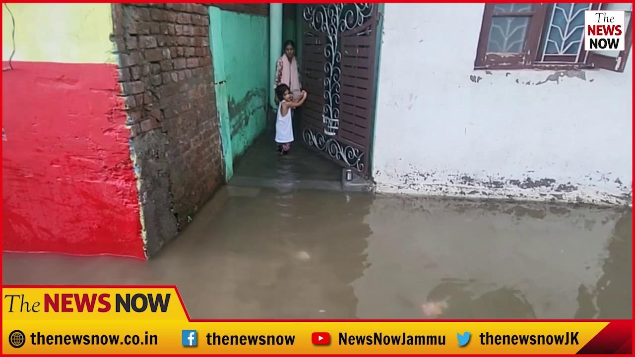 Heavy rainfall wreaks havoc in Doda Basti, Belicharana, Jammu, Severe waterlogging forces residents to drain water from homes