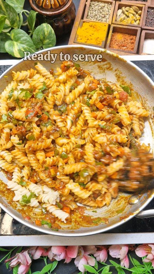 Veggie Pasta Recipe 😋🤩 ( save it for later) 
Ingredients- 
Spiral Pasta 
3tbsp of oil 
Salt 
Water 
Chopped Garlic 
Onions 
Tomato puree 
Carrot 
Capsicum 
Schezwan sauce 
Tomato sauce 
Red chilli powder 
Turmeric powder 
Green chillies 
Coriander 
Black pepper powder 
Pizza mix