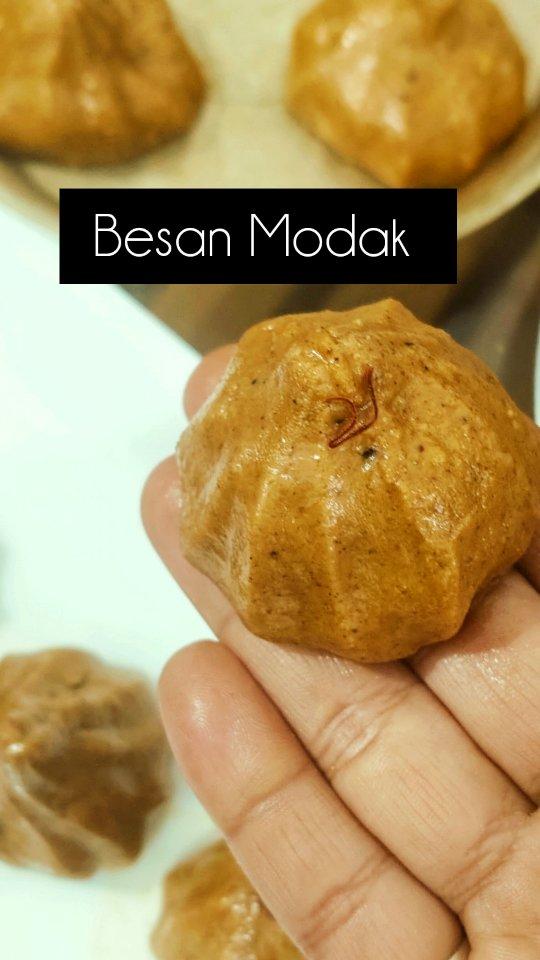 Wednesday means Modak for Bappa 🙏🏻

STEPS
Coconut mix 
Heat 4 tsp of ghee in a kadhai 
Add jaggery powder and coconut powder and mix 
Add cashew and stir fry on low flame 
Turn off the flame
Besan mix 
Heat half a cup of ghee in a kadhai 
Add 2 cups of besan and combine well 
Stir fry on low flame until besan turns Golden brown 
Add kesar milk and combine well 
Turn off the flame and let the mixture cool down a little bit
Once the besan mix  is slightly warm add  4 tsp of powdered sugar and mix well
Take a greased modak mould and add besan mix and make a cavity as shown in the video , in the cavity fill coconut mix and seal with besan mix as shown in the video
Shape all the Modak similarly and enjoy