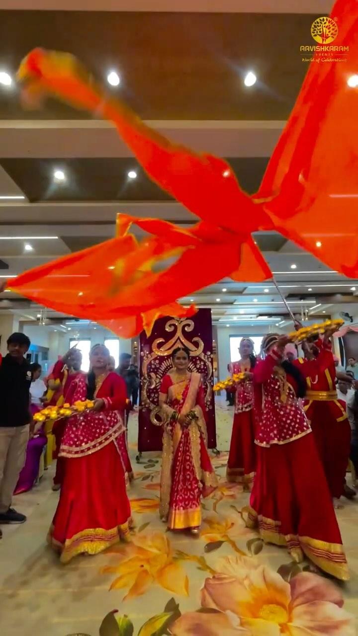 A Grand Maharashtrian Royal Wedding Entry You Can't Miss!

✨ Witness the epitome of grandeur with this Maharashtrian royal couple's entry at their spectacular Varmaala ceremony!✨ 

Dressed like a true king and queen, the groom in a regal white sherwani and the bride in a stunning red traditional saree adorned with golden ornaments take center stage
The entrance is nothing short of majestic, featuring: 
🕺🏻 Dancers in traditional Maharashtrian attire
🌸 A floral shower of rose petals 
🎇 Mesmerizing SFX and fireworks lighting up the stage 

This is the royal wedding vibe dreams are made of—authentic, regal, and unforgettable! Perfectly blending cultural heritage with choreographed elegance
Planning your dream wedding in Maharashtra?
Let us make your big day just as grand and magical! 

📌 Follow us for more luxury wedding ideas, Maharashtrian wedding themes, and grand event inspiration
DM us to create your royal wedding story today! 

Credits : 
Event Organized by :  aavishkaramevents mahesh_ninawe_official 
Decor By : gadwale_decorators 
SFX : parmar.kapil 
Venue : Golden Leaf, Amravati
Beautuful Bride : bakul_khetkade 

-----------------------------------------------------

Make your dream events in reality by contacting us : 
Aavishkaram Events 
8600204646 | helloaavishkaram.com
www.aavishkaram.com

-----------------------------------------------------

[varmaala, entry, couple, bride, groom, red, white, squad, dancers, choreography, background dancers, flowers, floral, rose, luxury, lavish, grand, event planner, event organizer, amravati, nagpur, pune, mumbai, akola, yavatmal, achalpur, paratwada, albela sajan]